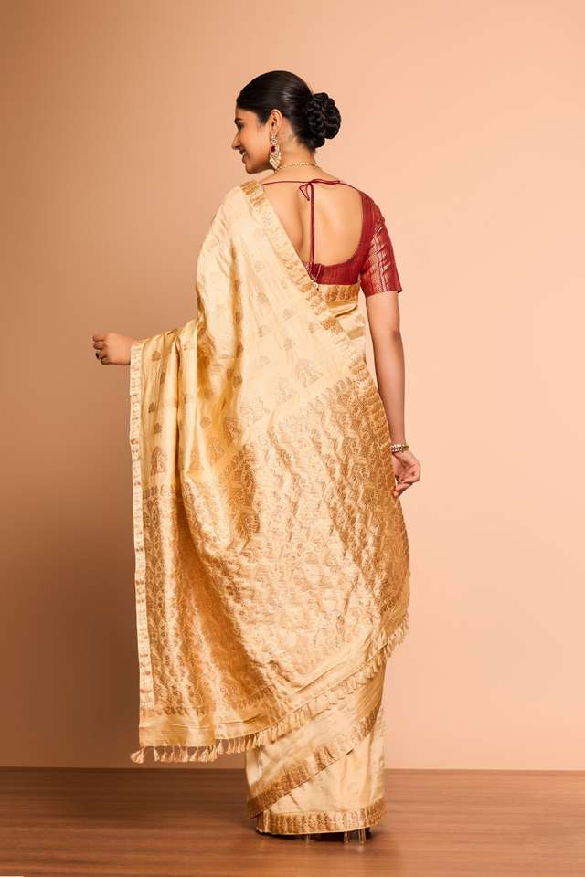 Beige Assam Woven Pure Tussar Silk Saree thumbnail image number null