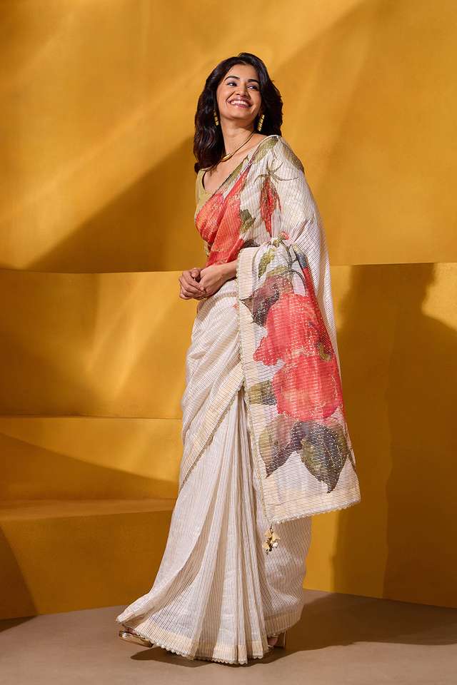 Off White Pure Cotton Tissue Embroidered Saree thumbnail image number null