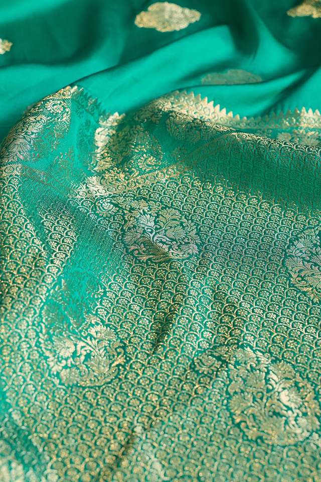 Green Woven Pure Viscose Saree thumbnail image number null