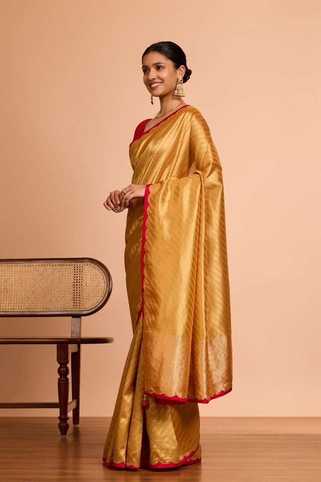Yellow  Viscose Tissue Woven Saree thumbnail image number null