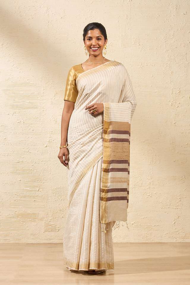 Beige Woven Pure Tussar Silk Saree thumbnail image number null