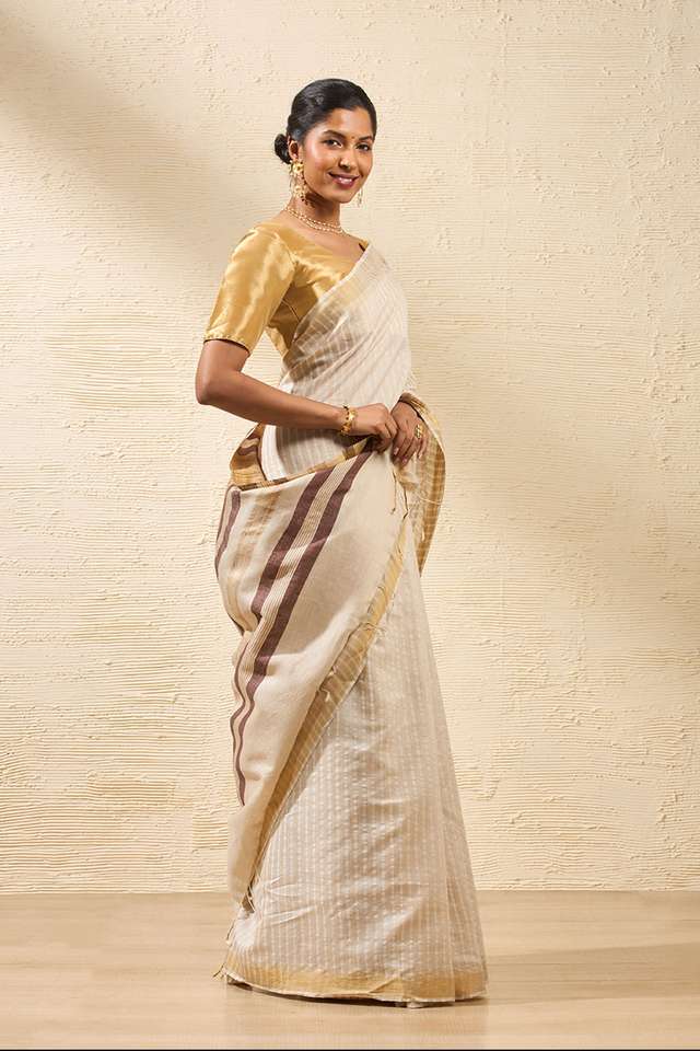 Beige Woven Pure Tussar Silk Saree thumbnail image number null