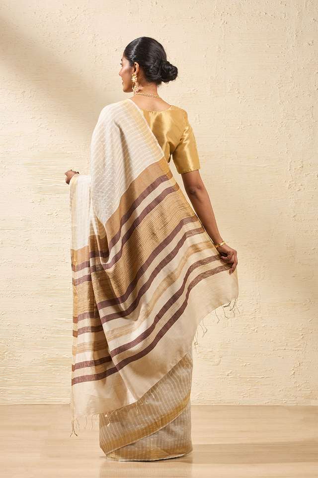Beige Woven Pure Tussar Silk Saree thumbnail image number null