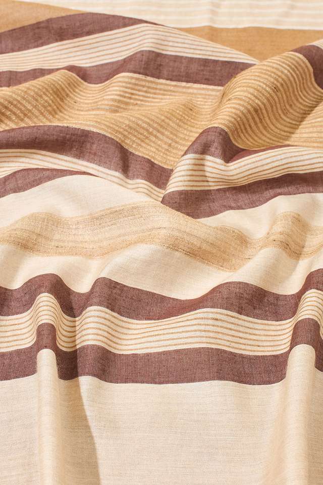 Beige Woven Pure Tussar Silk Saree thumbnail image number null