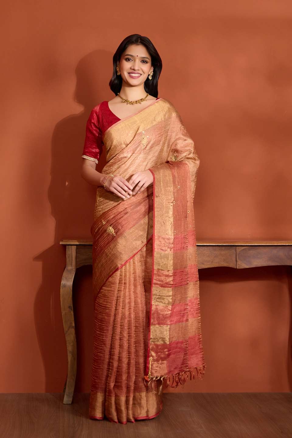 Dark Orange Pure Silk Tissue Embroidered Saree