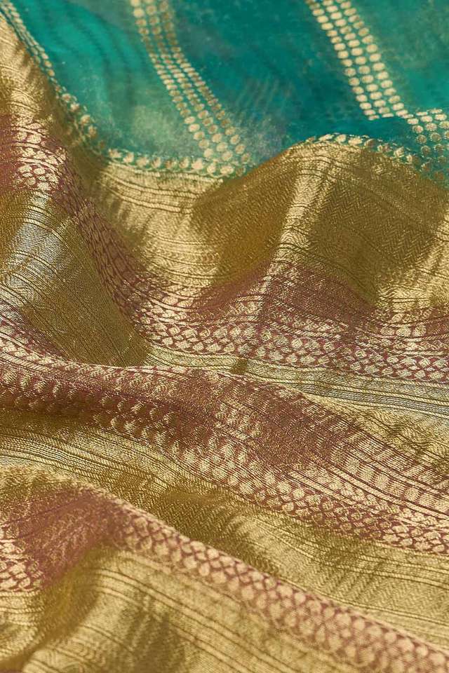 Blue Woven Pure Georgette Tissue Saree thumbnail image number null